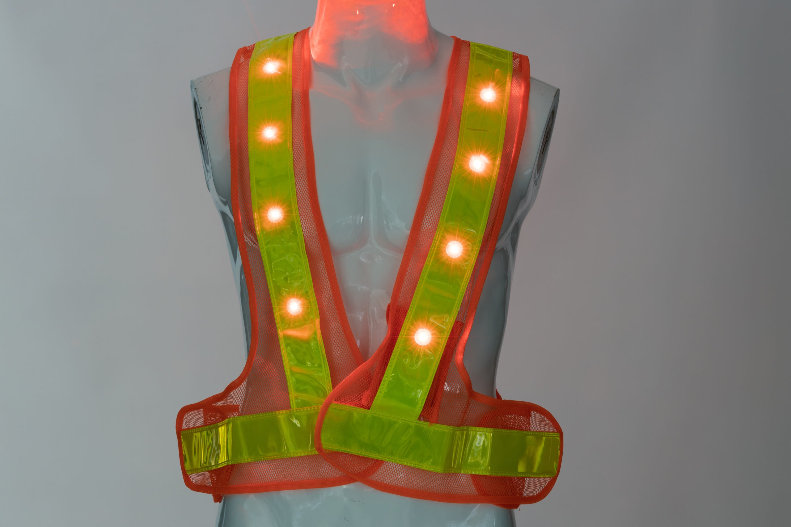 Orange Warnweste mit LED 3 Stufen reflektierend - Metal Badge